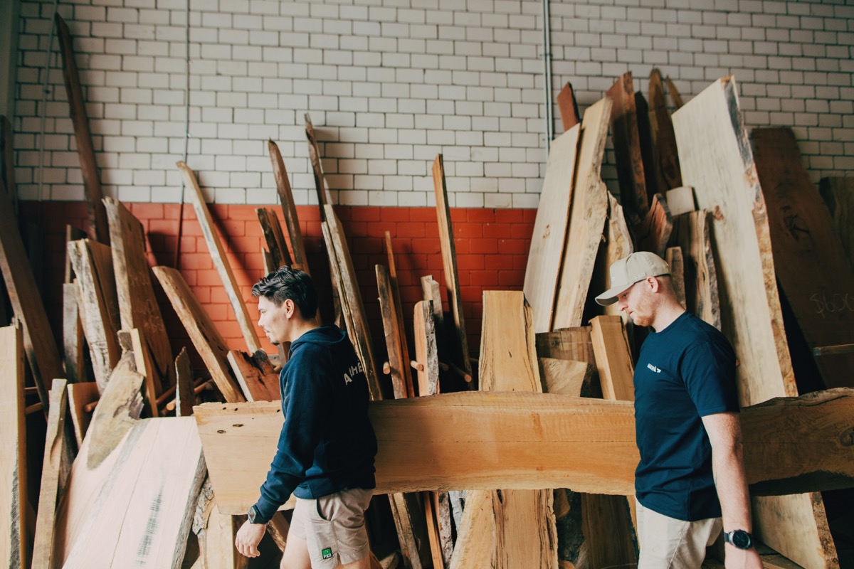 AGATHĒ team selecting timber slabs at a timber yard