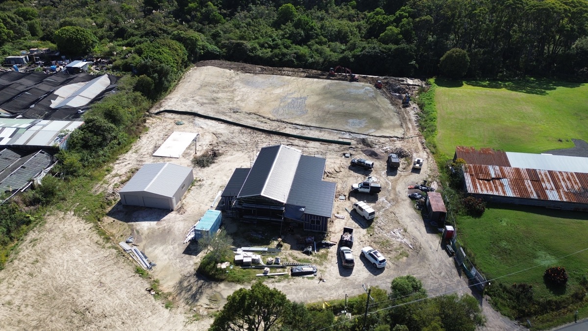 Aerial view of a Sydney construction site surrounded by bushland