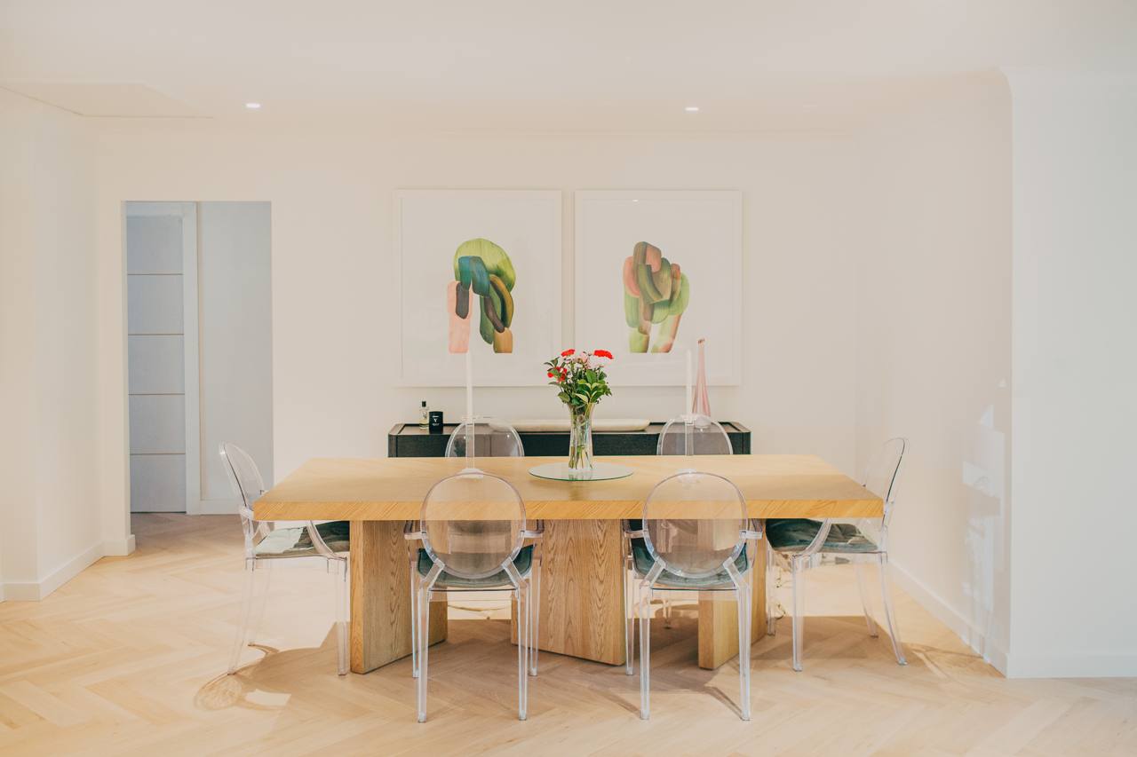 Dining area with a timber table and natural light in the Castle Hill home
