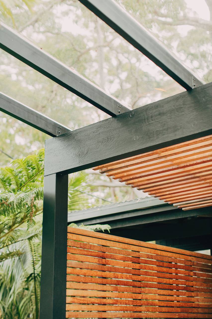 Custom pergola and hardwood batten detailing at the Chatswood home